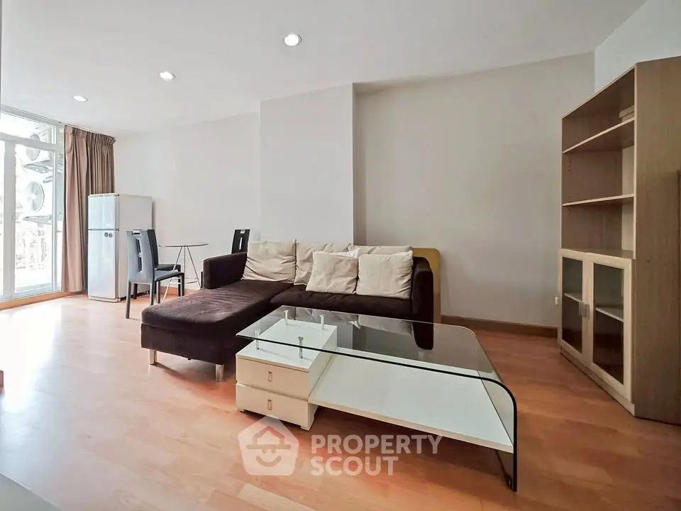 Spacious living room with modern furniture and natural light