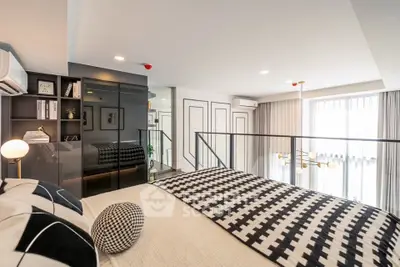 Modern bedroom with stylish decor and large windows in a contemporary apartment