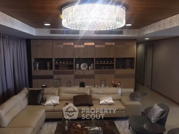 Luxurious living room with elegant chandelier and modern decor