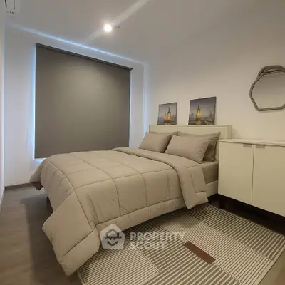 Modern bedroom with cozy bedding and stylish decor