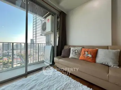 Modern living room with balcony view in high-rise apartment