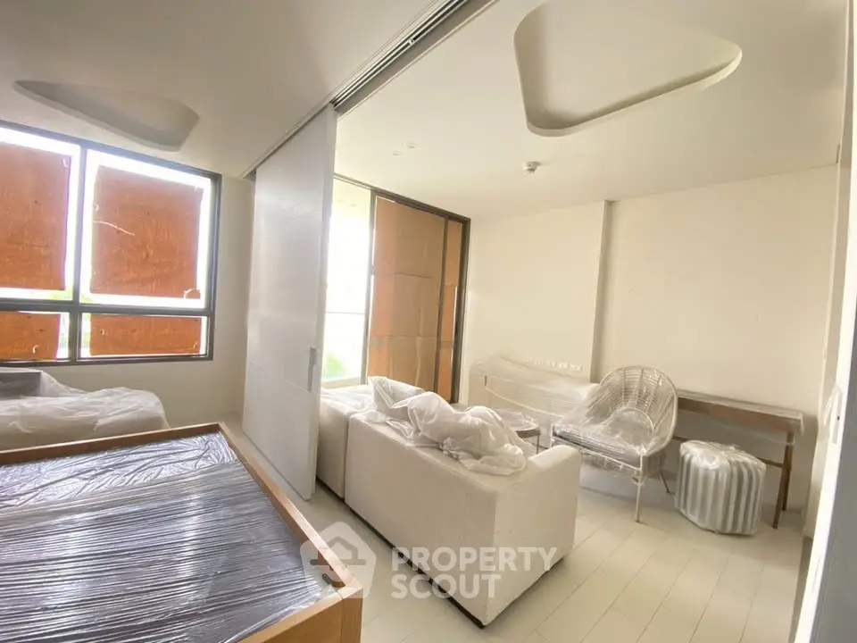 Modern living room with minimalist design and natural light