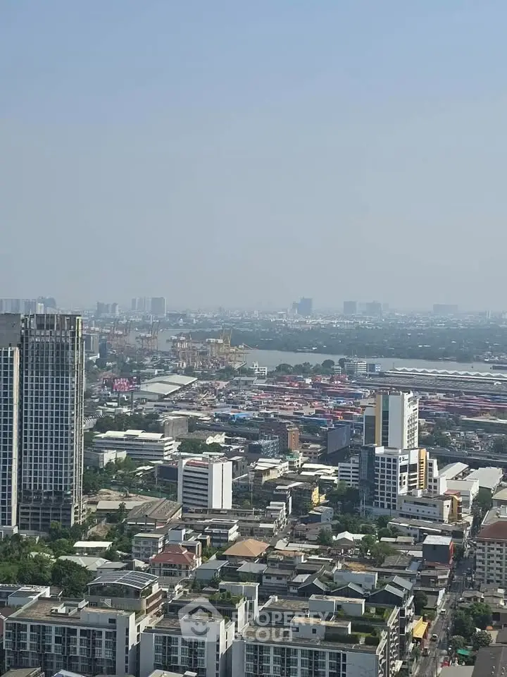Stunning cityscape view from high-rise building showcasing urban skyline and architectural diversity.