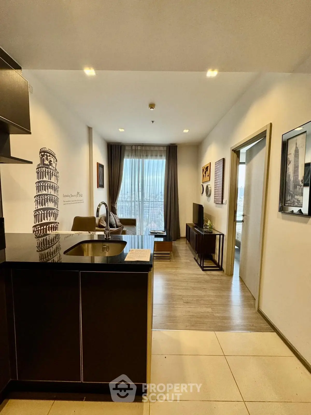 Modern open-layout living room with stylish decor and kitchen island