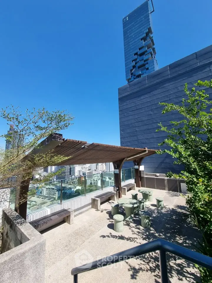 Stunning rooftop terrace with modern seating and panoramic city views, perfect for relaxation and entertainment.