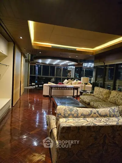 Luxurious living room with elegant furniture and stunning city view