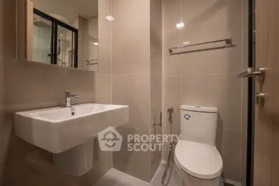 Modern bathroom with sleek fixtures and neutral tones