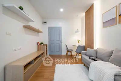 Modern living room with cozy sofa and stylish decor