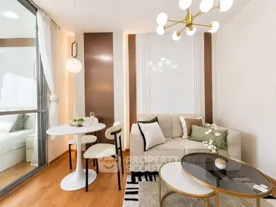Modern living room with elegant decor and natural light, featuring a cozy seating area and stylish lighting.