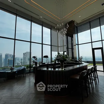 Luxurious penthouse with panoramic city views and elegant interior design.