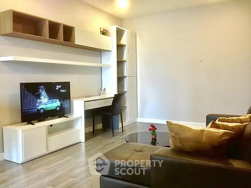 Modern living room with sleek furniture and built-in shelving, perfect for stylish urban living.