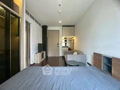 Modern studio apartment with sleek design and cozy living area