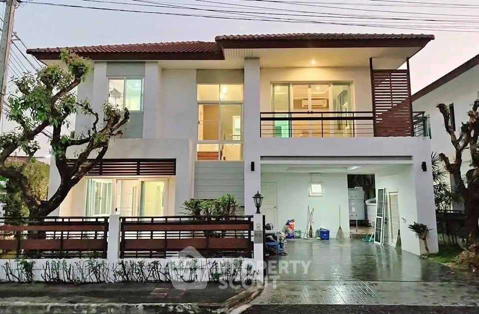 Stunning modern two-story house with spacious balcony and sleek design