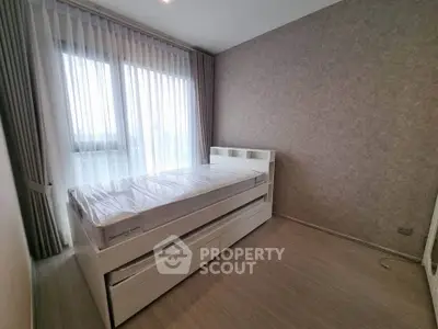 Modern bedroom with sleek design and natural light