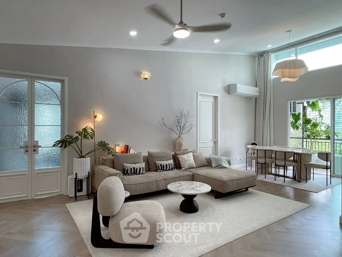 Spacious modern living room with elegant decor and natural light