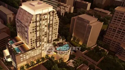 Luxurious high-rise building with stunning rooftop pool and cityscape view at night.