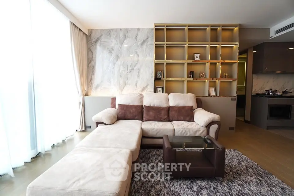 Luxurious modern living room with elegant marble wall and cozy sectional sofa