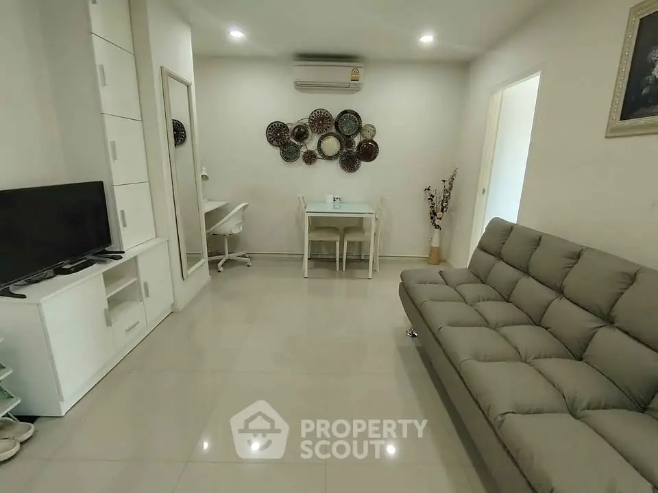 Modern living room with sleek furniture and stylish decor