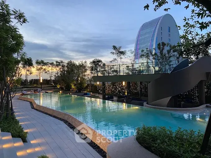 Luxurious rooftop pool with stunning sunset view and modern architecture