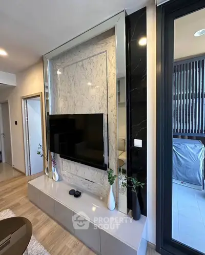 Modern living room with sleek TV setup and stylish decor