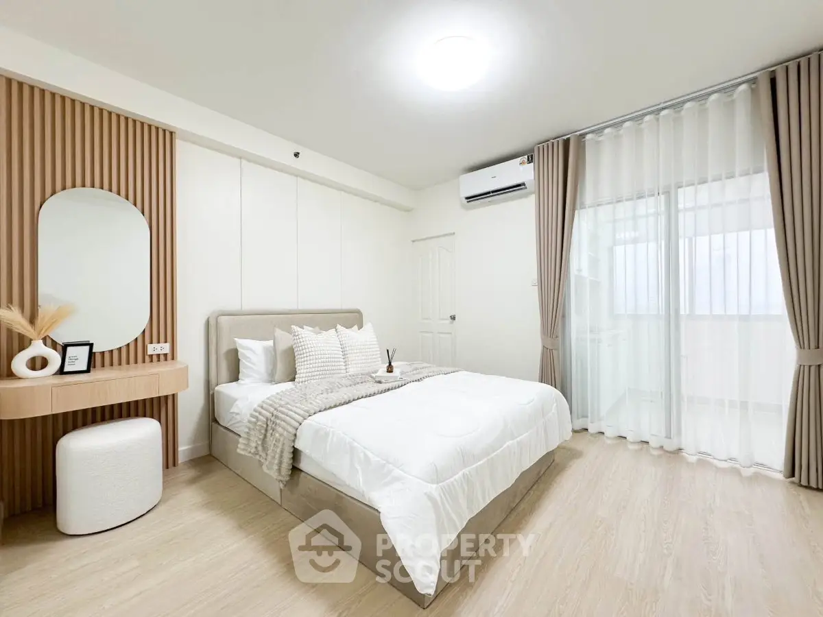Modern minimalist bedroom with cozy decor and natural light