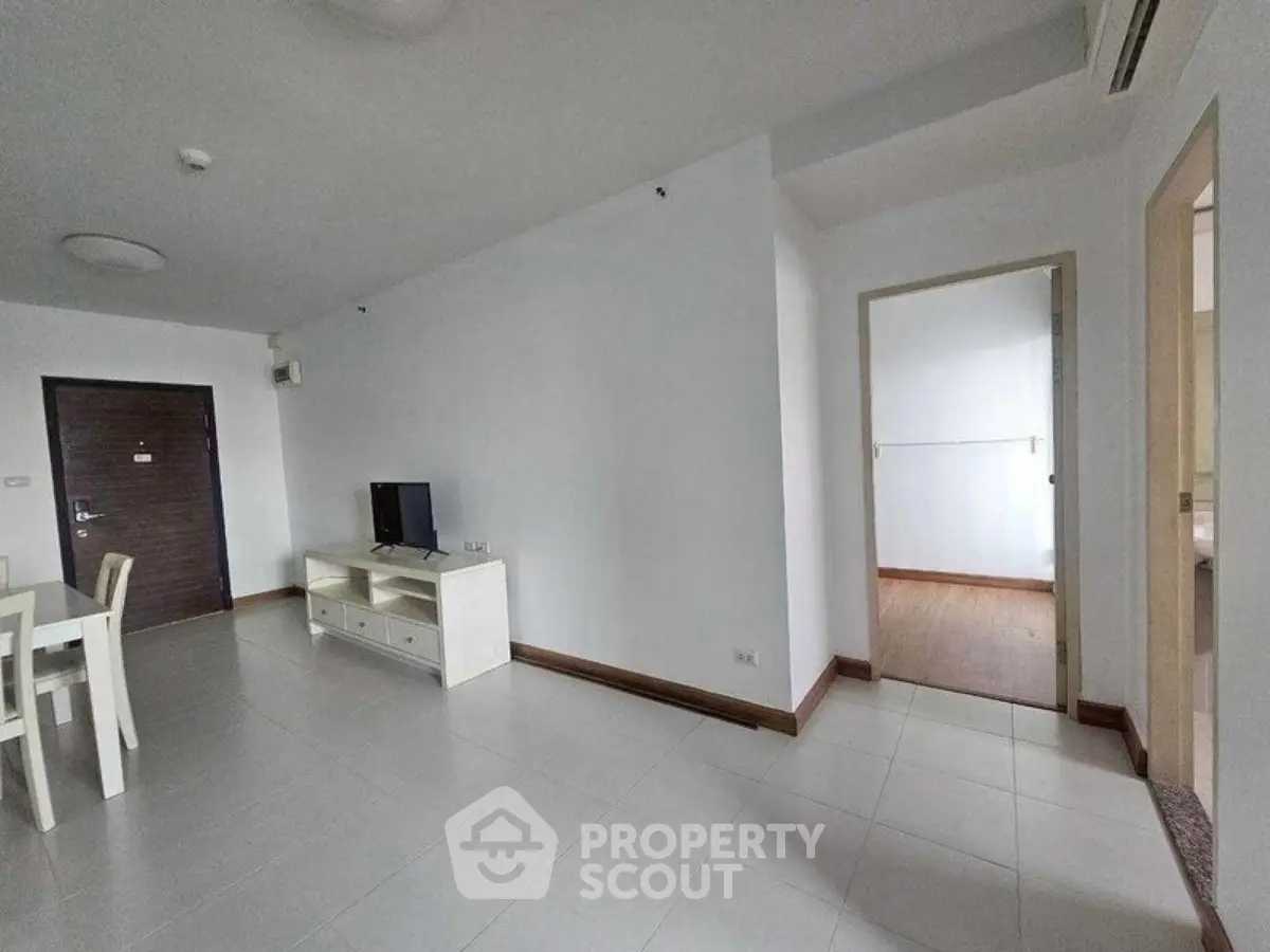 Spacious modern living room with minimalist decor and open layout