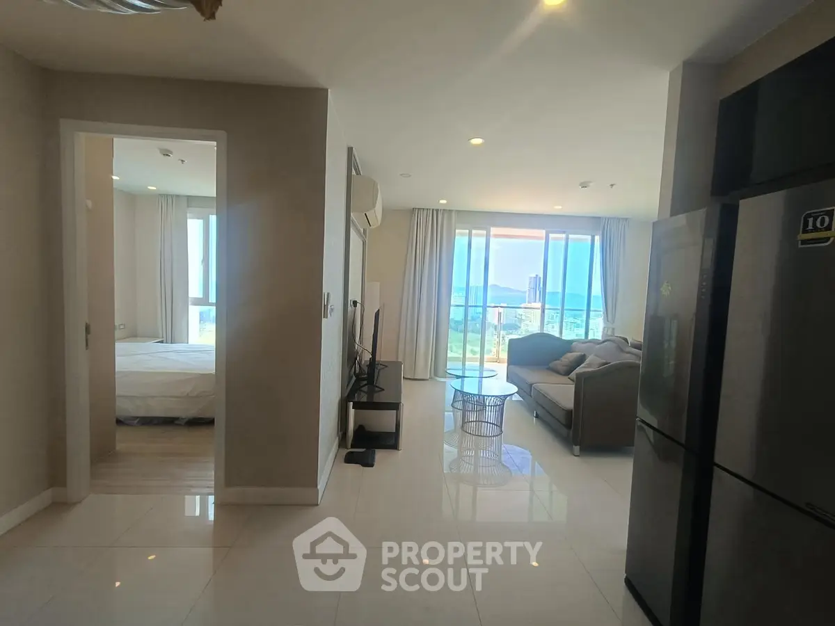 Modern open-layout apartment with stunning sea view and sleek interior design.