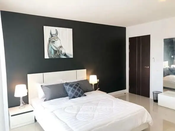 Modern bedroom with stylish decor and elegant lighting