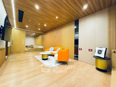 Modern living room with stylish furniture and wooden accents