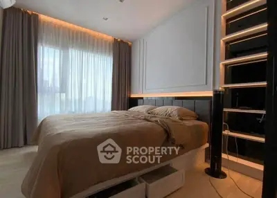 Modern bedroom with sleek design and ambient lighting