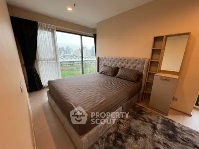 Modern bedroom with city view and stylish decor