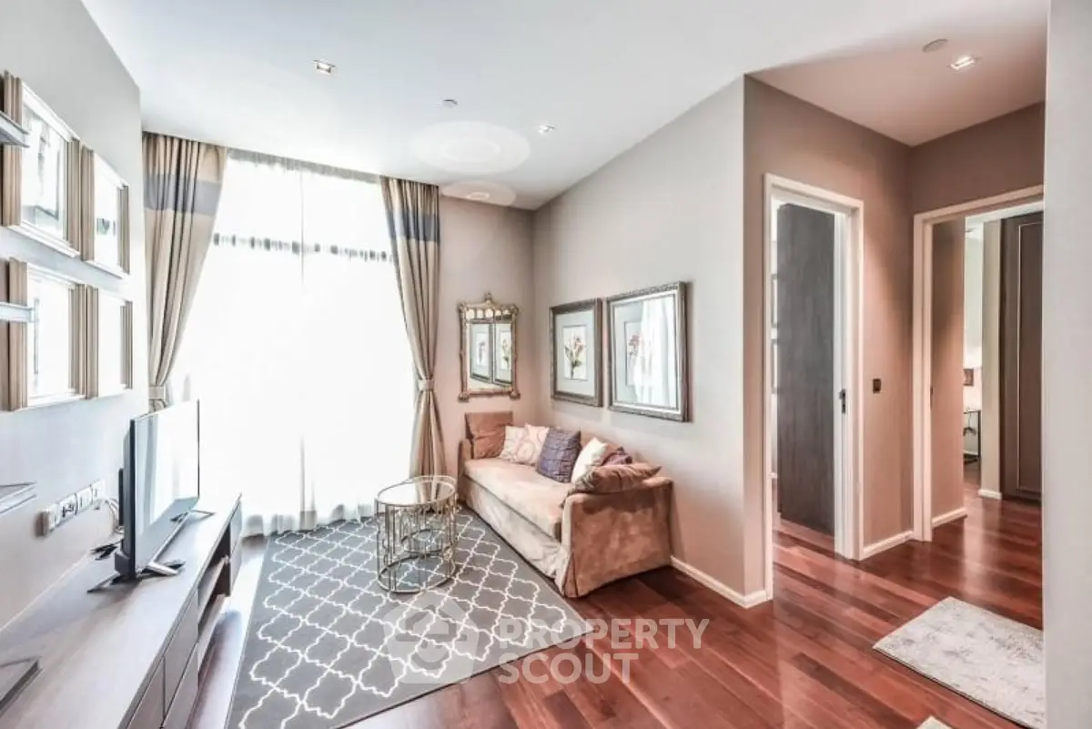 Elegant living room with hardwood floors and stylish decor in modern apartment