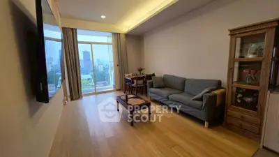 Modern living room with city view and elegant furnishings