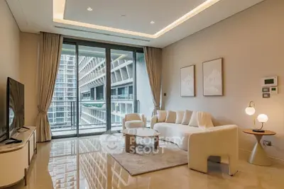 Luxurious modern living room with elegant decor and stunning city view through large windows.