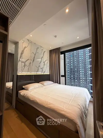 Luxurious bedroom with city view and modern design
