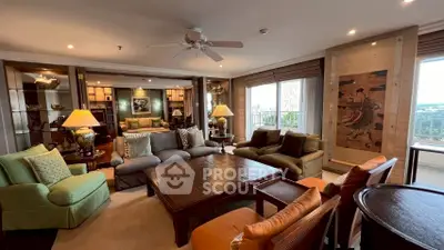 Luxurious living room with elegant decor and spacious seating area, perfect for entertaining guests.