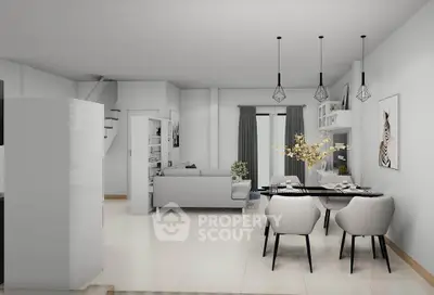 Modern open-plan living and dining area with stylish decor and ample natural light.