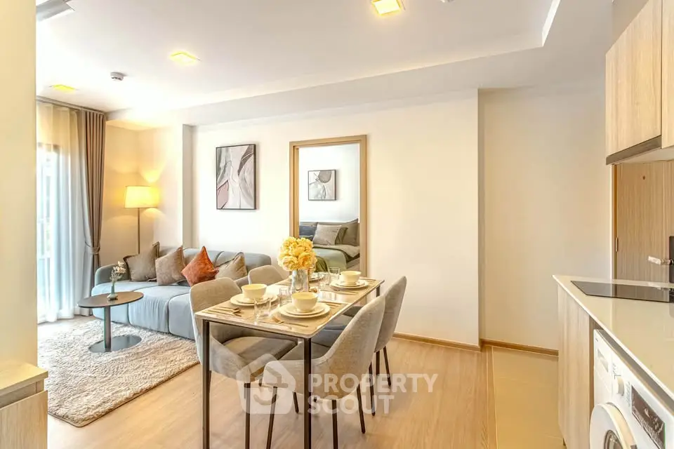 Modern living room with cozy dining area and stylish decor