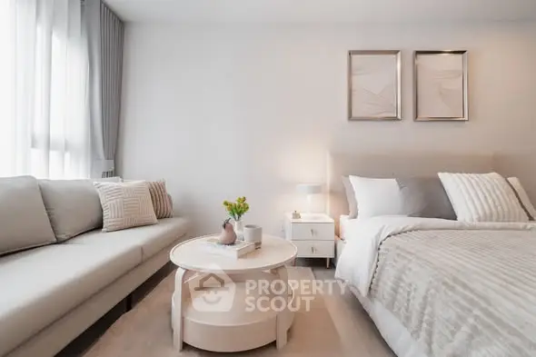 Elegant bedroom with cozy sofa and stylish decor