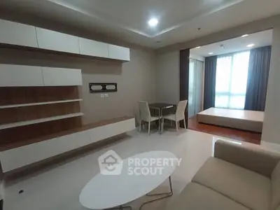 Modern living room with sleek furniture and natural light