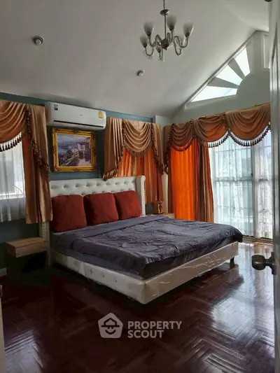 Luxurious bedroom with elegant drapes and stylish decor