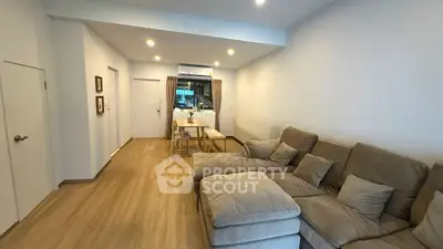 Spacious living room with cozy sectional sofa and modern decor