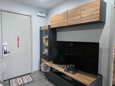 Modern living room with sleek TV unit and stylish storage cabinets