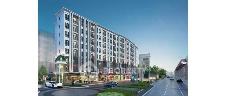 Modern multi-story residential building with street view and shops.