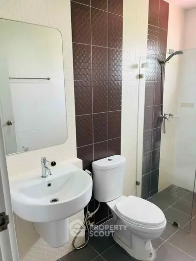 Modern bathroom with sleek fixtures and stylish tile design
