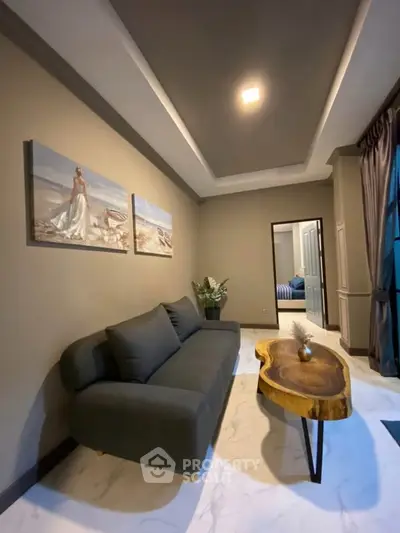 Stylish living room with modern sofa and unique wooden coffee table, perfect for relaxation.