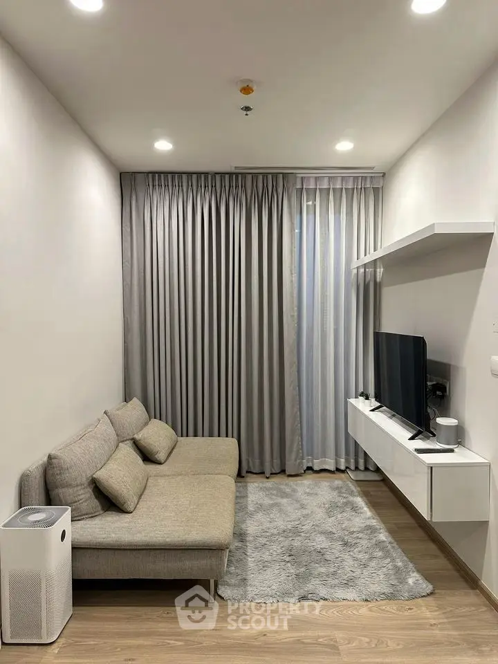 Modern living room with sleek furniture and ambient lighting