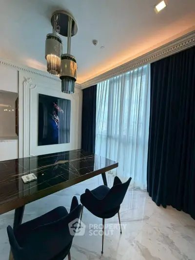 Elegant dining room with marble floor, modern chandelier, and large window with dark curtains.
