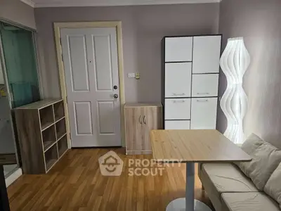 Cozy living room with modern furniture and stylish lighting, perfect for relaxation and comfort.