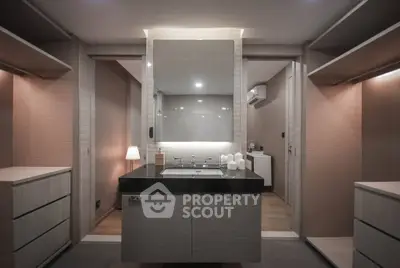 Luxurious modern bathroom with sleek design and ambient lighting